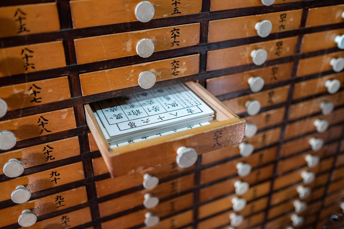 A paper omikuji fortune slip of the kind drawn at Senso-ji